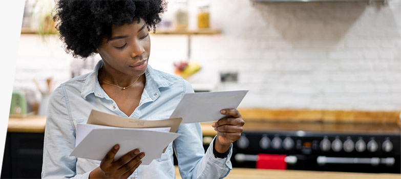 Local small business owner preparing to send mail.