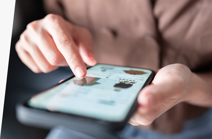 Person using a smartphone to shop on an ecommerce platform or marketplace.