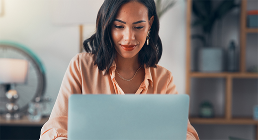 Woman working on her laptop.